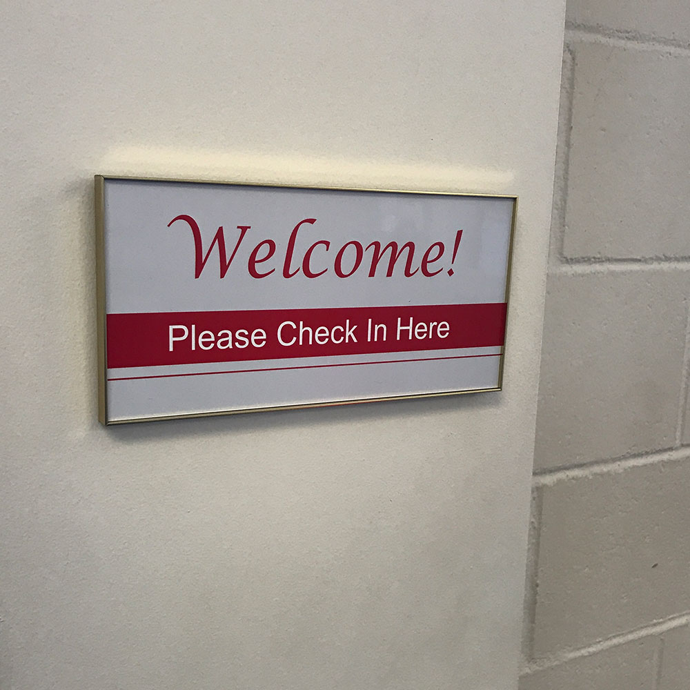 Office sign with frame