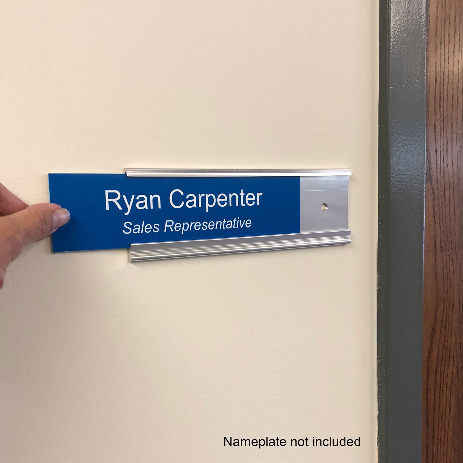 https://www.napnameplates.com/wp-content/uploads/2018/08/Executive-Nameplate-Holder-Silver-with-Nameplate.jpg